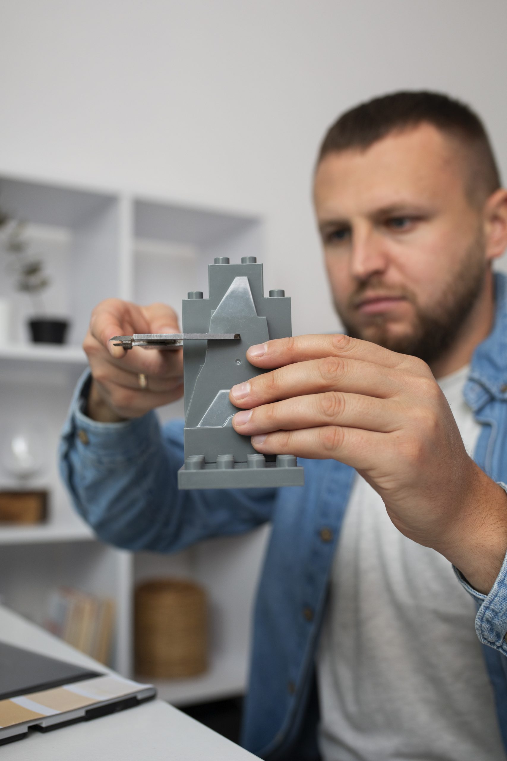 Engineer holding a 3D printed prototype hardware