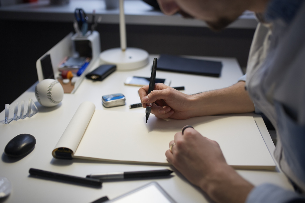 Hardware product design process with engineers reviewing prototype and CAD